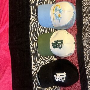 Public Saint trucker hats! 💙💛💚🖤